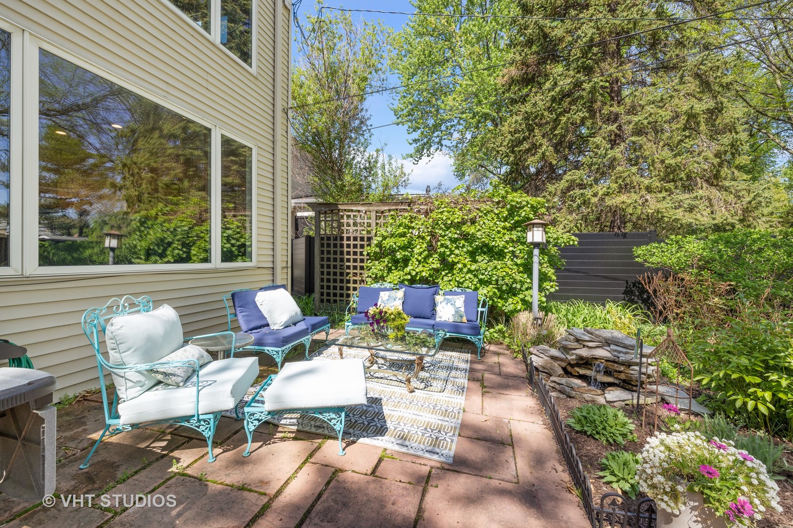 526 Uvedale Road Riverside, IL 60546 - Photo 27 of 34 a view of backyard with outdoor seating