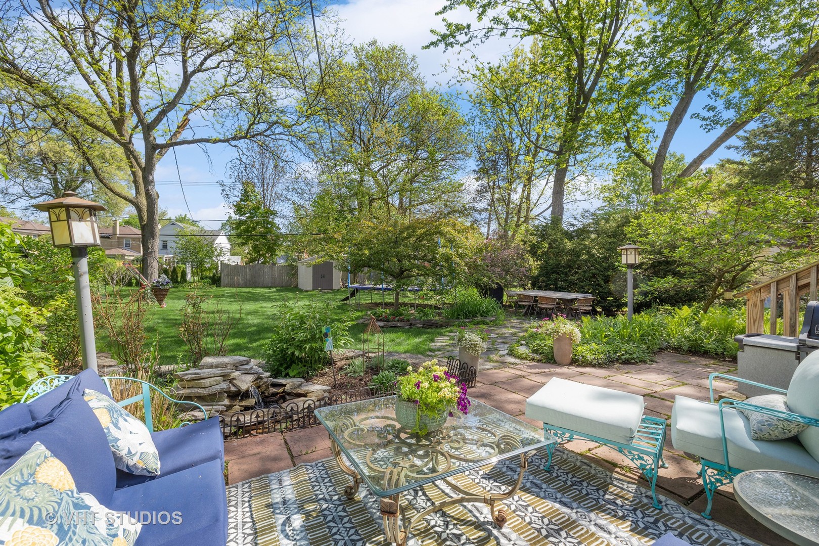 526 Uvedale Road Riverside, IL 60546 - Photo 28 of 34 a view of backyard with seating space and green space