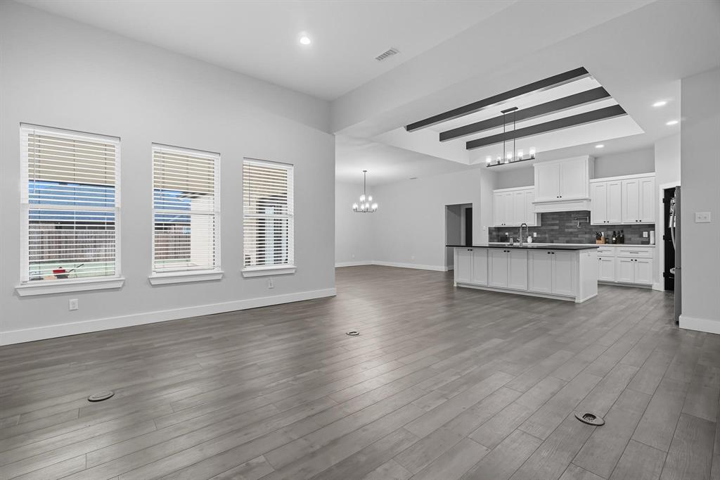 6502 Randy Avenue Abilene, TX 79606 - Photo 9 of 37 a view of kitchen with wooden floor and electronic appliances