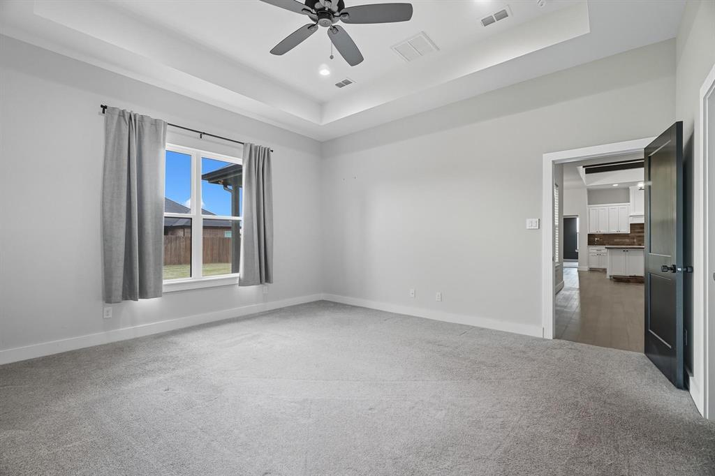6502 Randy Avenue Abilene, TX 79606 - Photo 14 of 37 a view of empty room with a ceiling fan