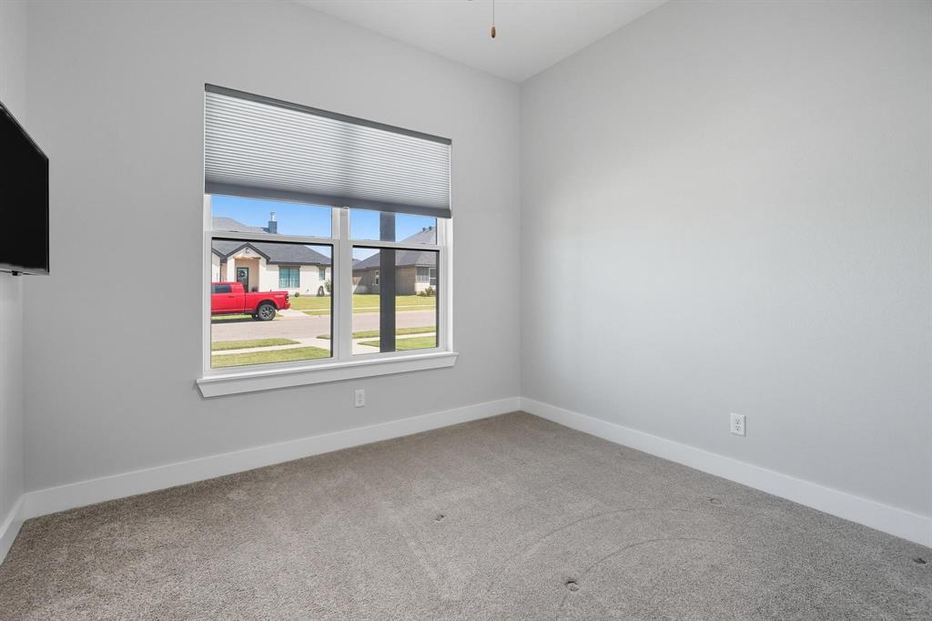 6502 Randy Avenue Abilene, TX 79606 - Photo 22 of 37 an empty room with a window