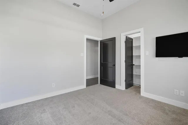 a view of a storage & utility room with a window