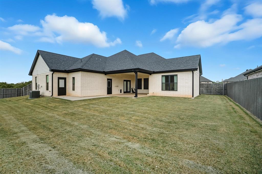 6502 Randy Avenue Abilene, TX 79606 - Photo 30 of 37 a front view of a house with a garden