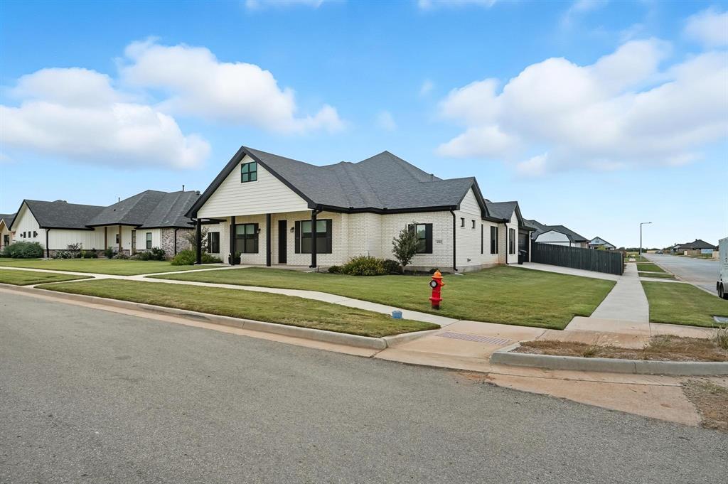6502 Randy Avenue Abilene, TX 79606 - Photo 35 of 37 a front view of a house with a yard