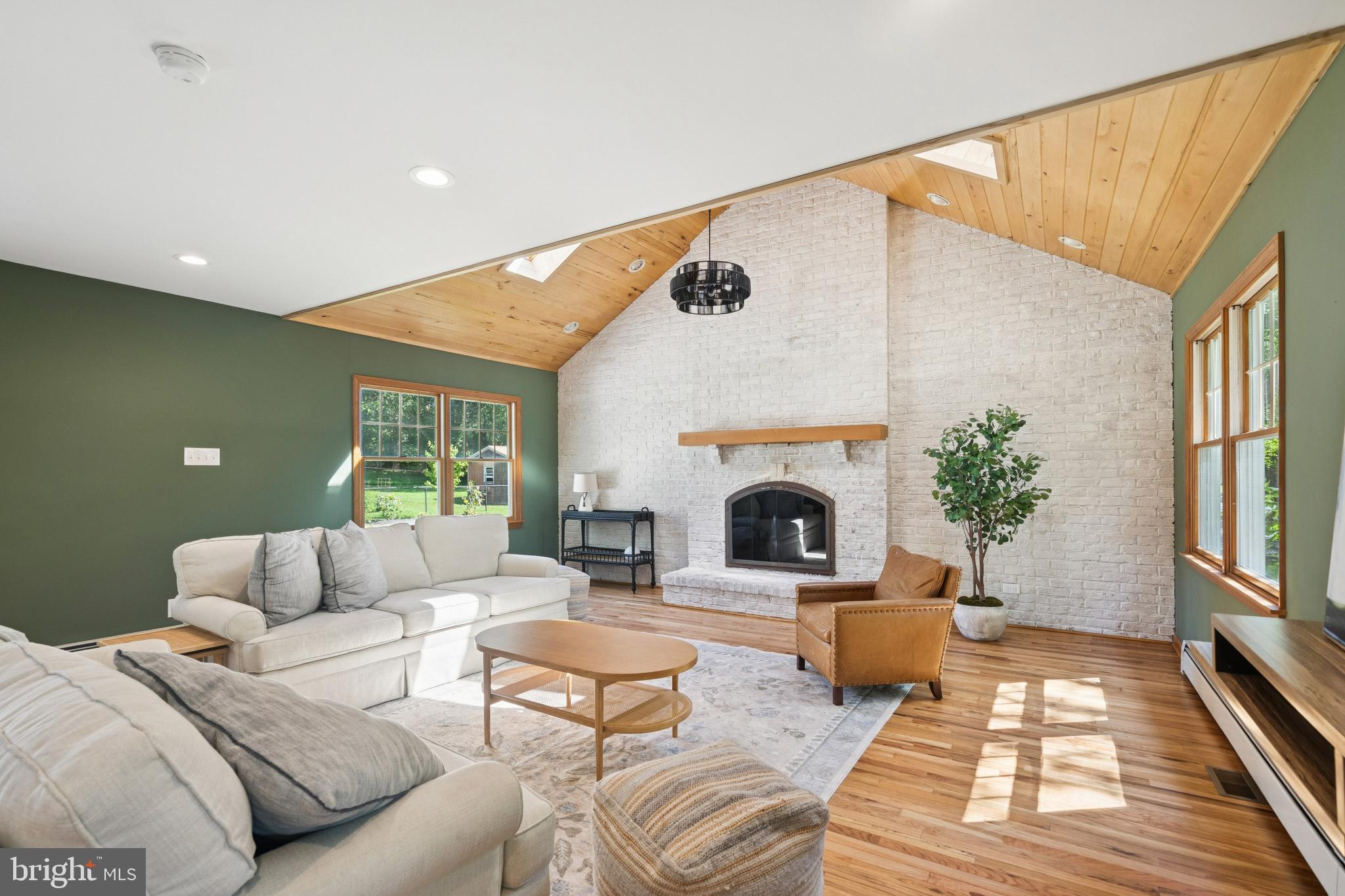 425 4th Avenue Haddon Heights, NJ 08035 - Photo 8 of 26 a living room with furniture and a fireplace