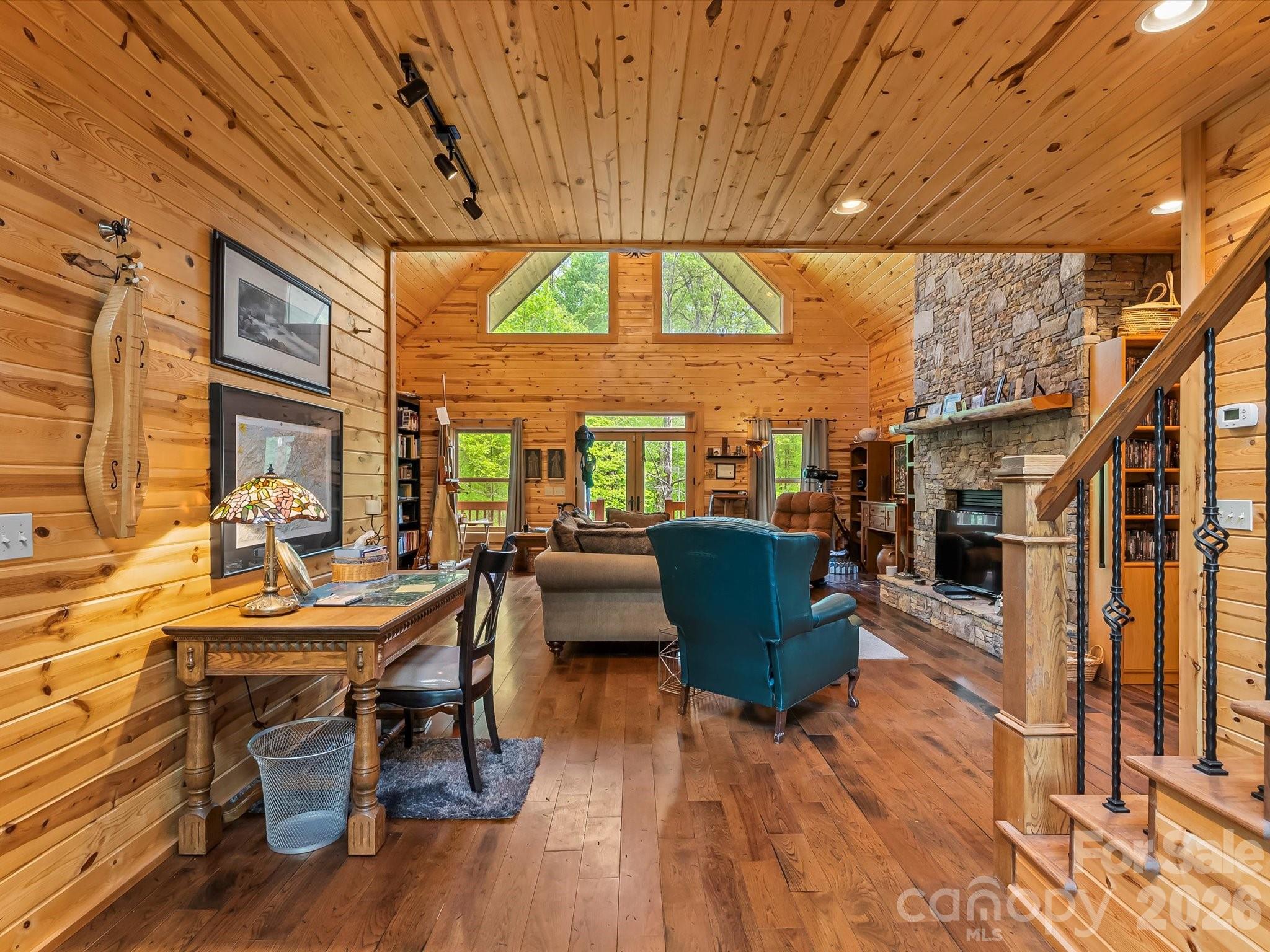 917 Otter Mountain Road Topton, NC 28781 - Photo 27 of 48 a living room with furniture and a wooden floor