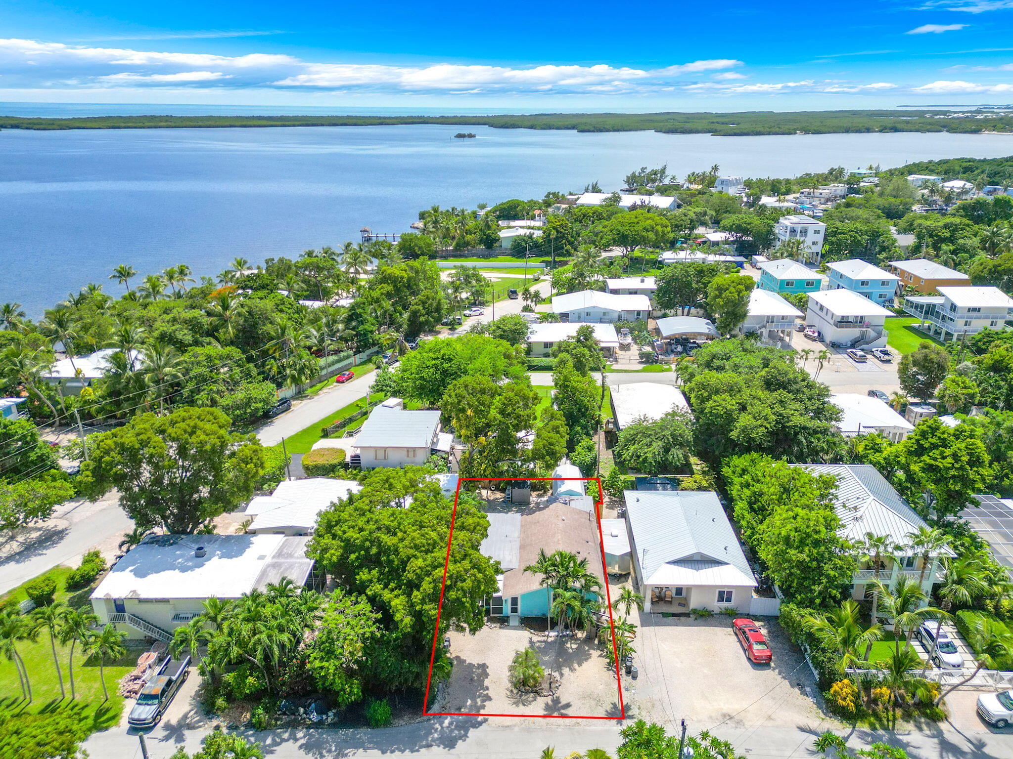 67 Jewfish Avenue Key Largo, FL 33037 - Photo 1 of 43 a view of a city with an ocean