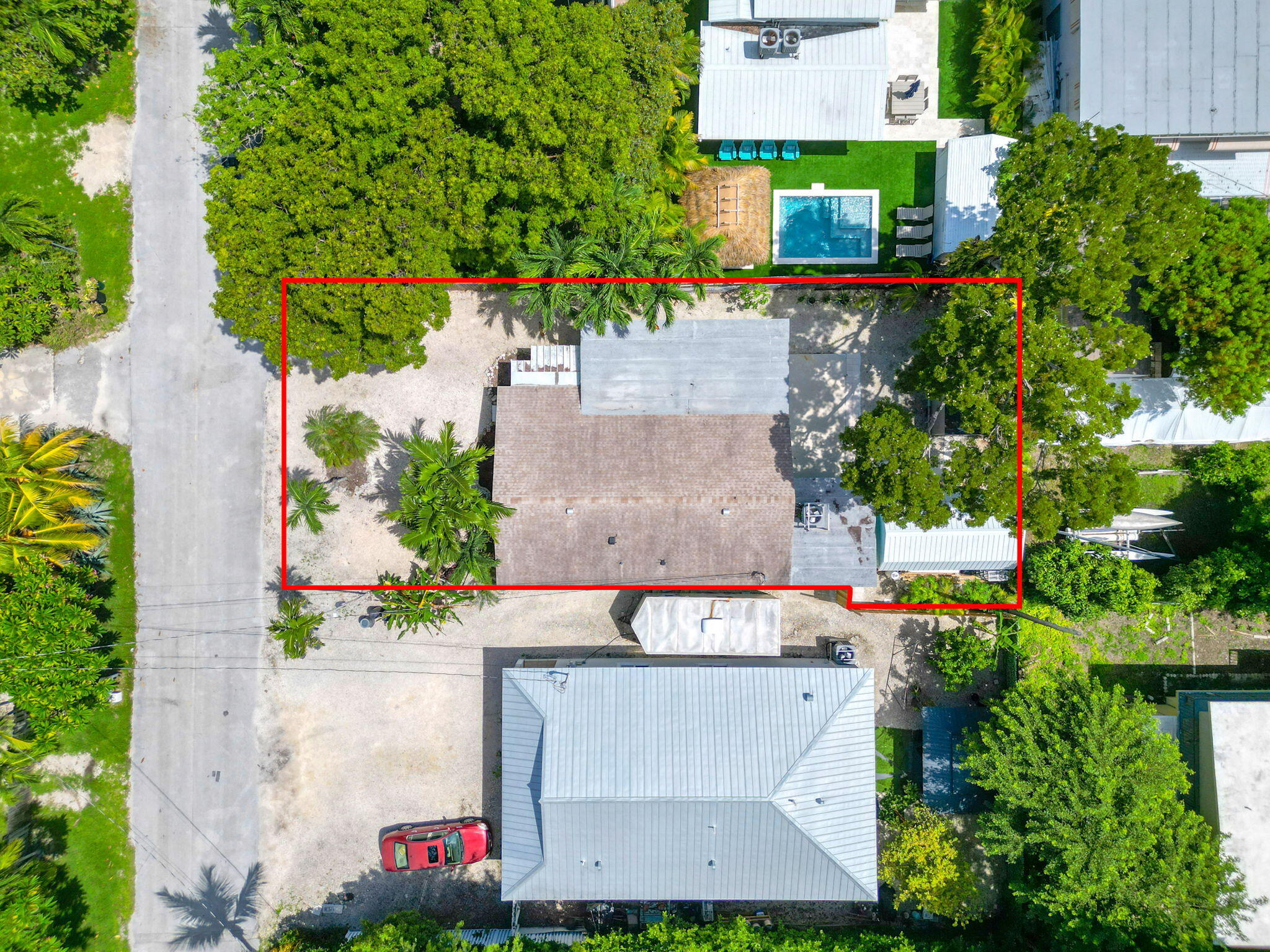 67 Jewfish Avenue Key Largo, FL 33037 - Photo 29 of 43 an aerial view of a house with a yard and garden