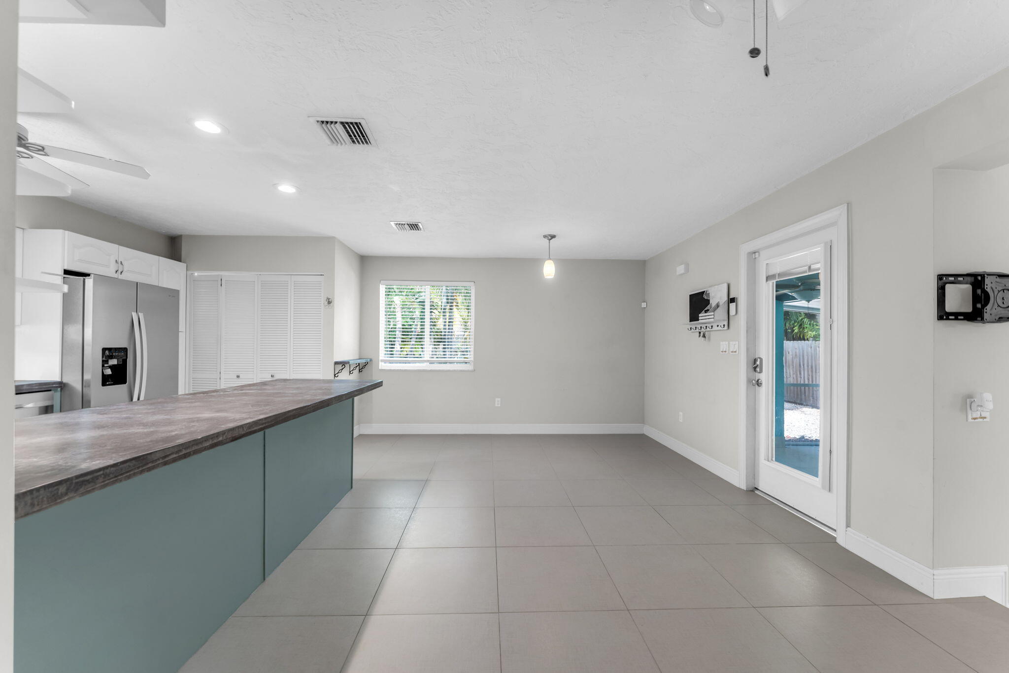 67 Jewfish Avenue Key Largo, FL 33037 - Photo 3 of 43 a large kitchen with a window and a sink