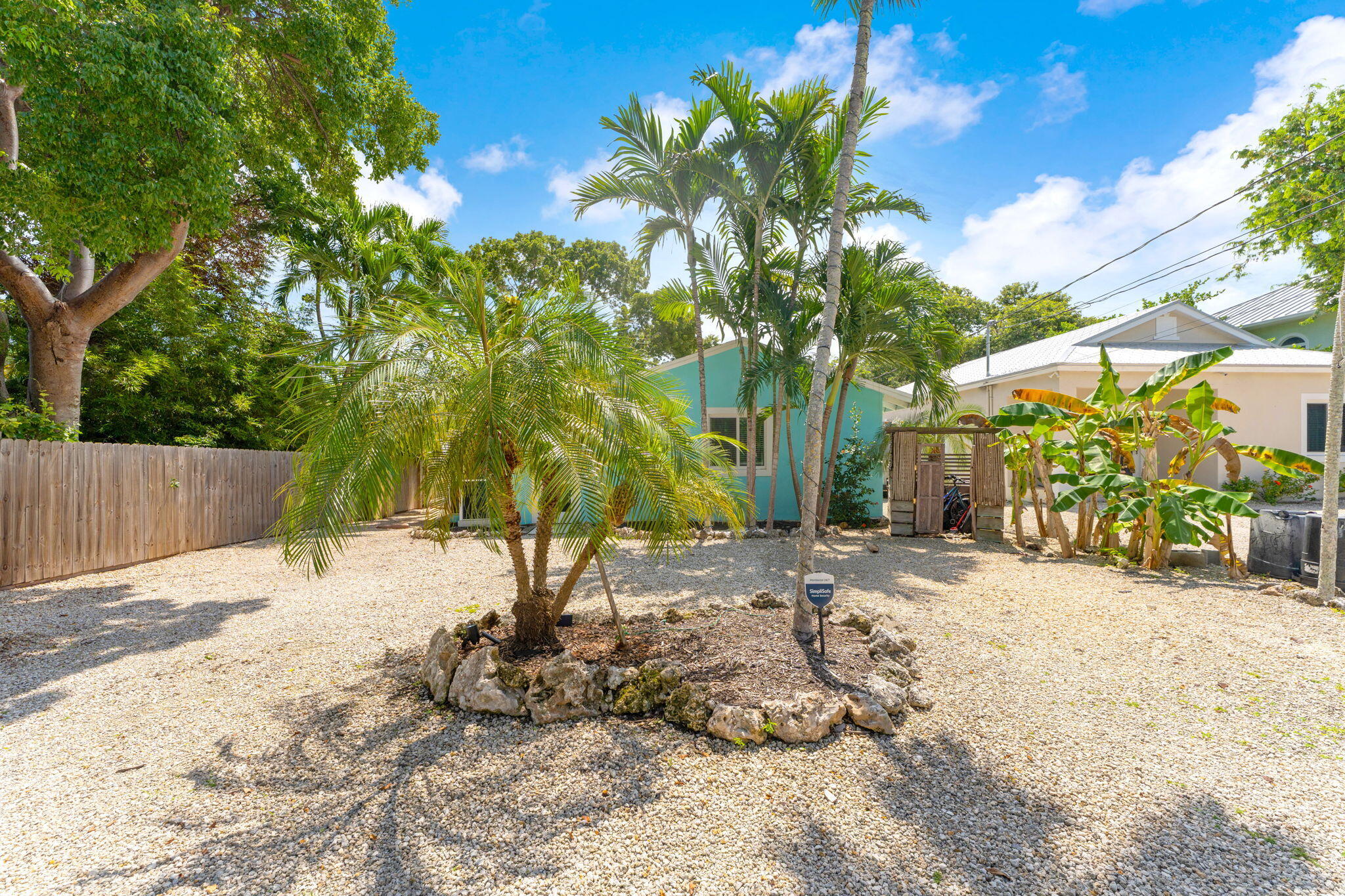67 Jewfish Avenue Key Largo, FL 33037 - Photo 34 of 43 a view of a backyard with a tree