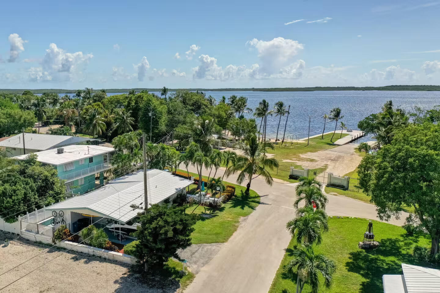 67 Jewfish Avenue Key Largo, FL 33037 - Photo 38 of 43 a aerial view of a house with a yard and garden