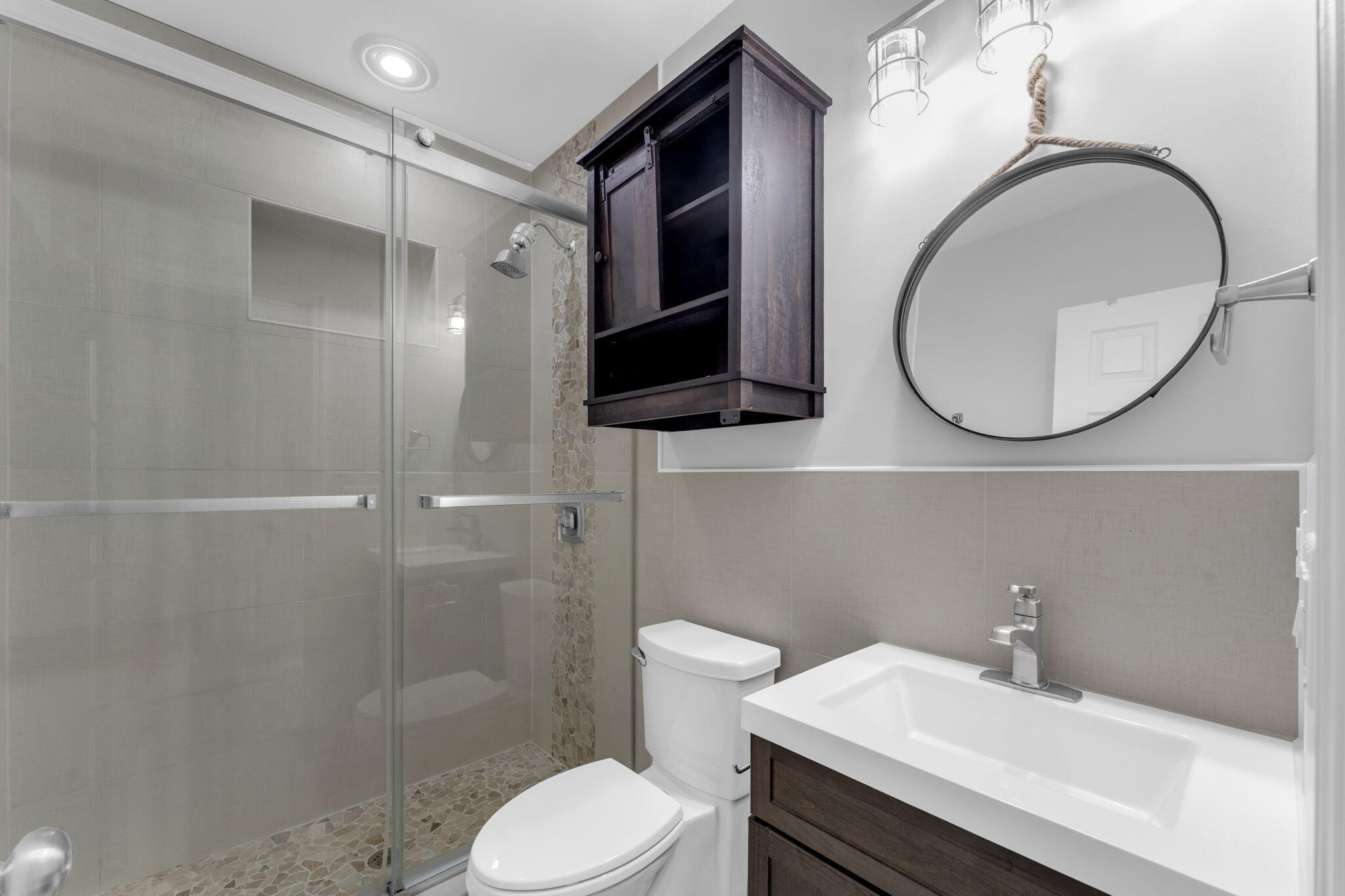 67 Jewfish Avenue Key Largo, FL 33037 - Photo 10 of 43 a bathroom with a sink toilet and shower