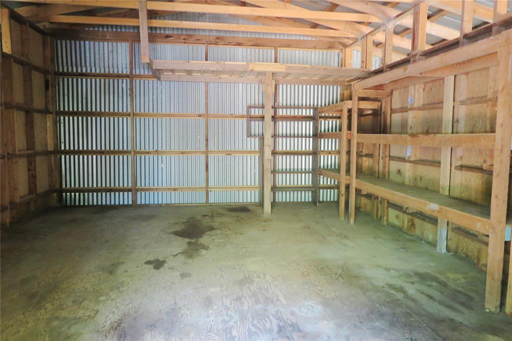 153-UNIT Ranch Road San Mateo, FL 32187 - Photo 32 of 34 a view of a room with racks on the wall