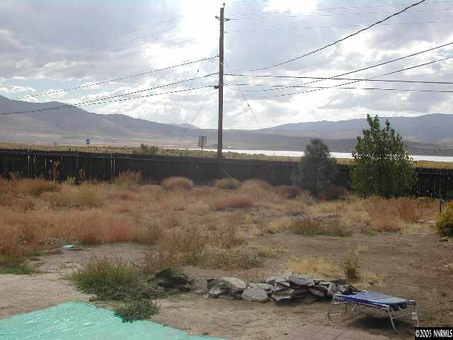 25 Ouzel Way Reno, NV 89508 - Photo 8 of 8 a view of a lake with a mountain in the background