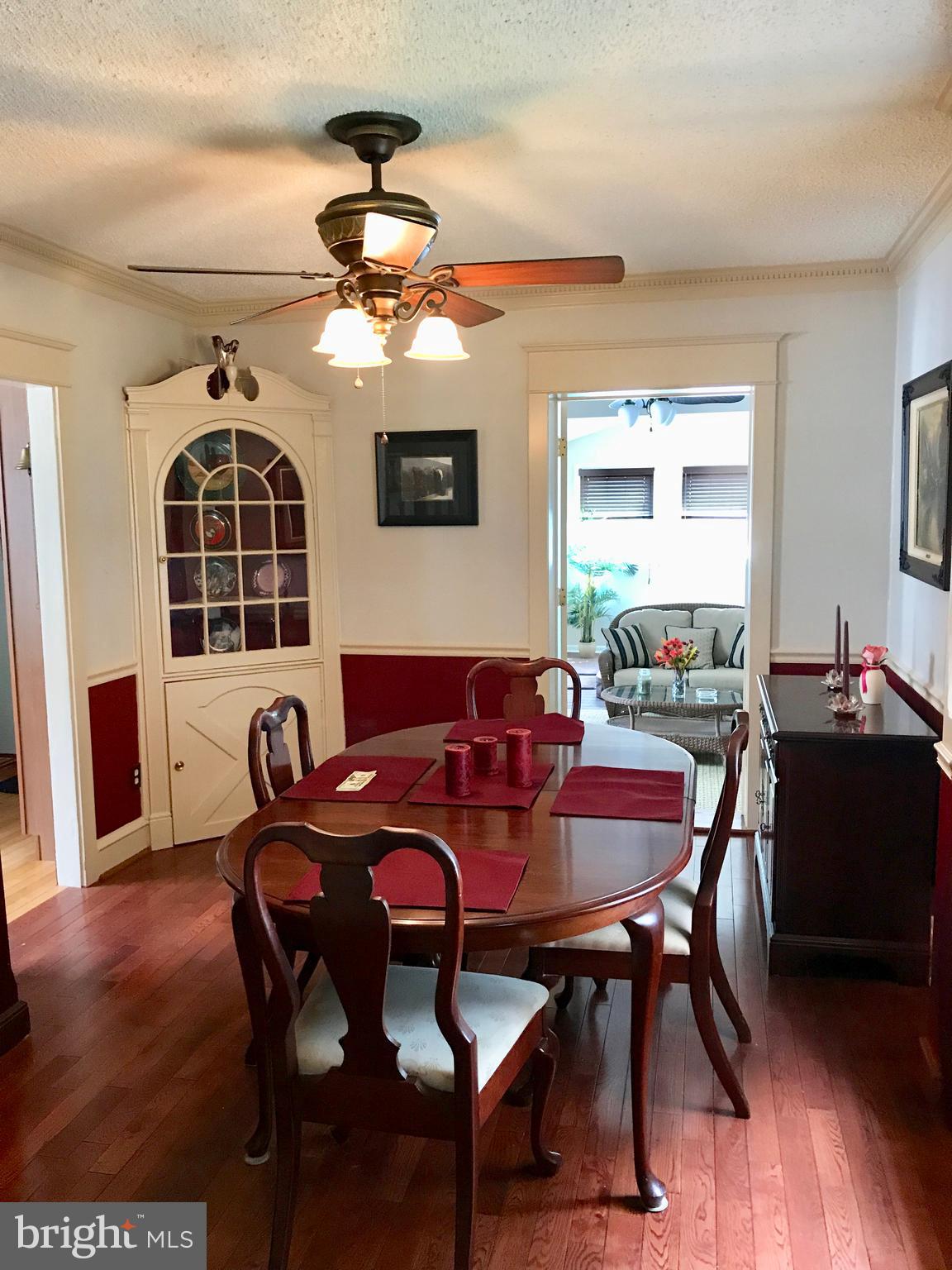 235 East Roland Road Brookhaven, PA 19015 - Photo 7 of 20 Dining room with cherry wood flooring