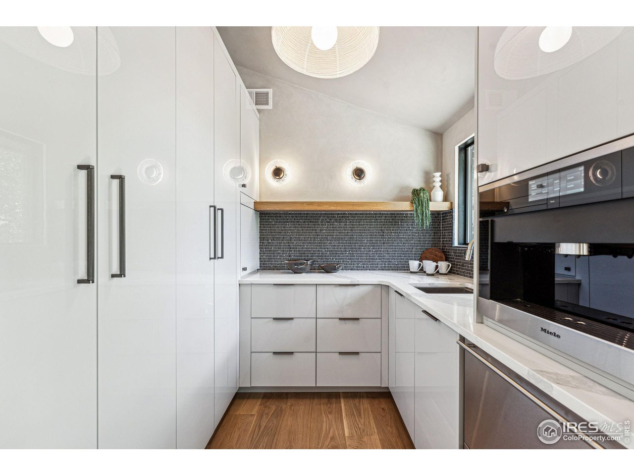 814 7th Street Boulder, CO 80302 - Photo 17 of 40 Butler's Pantry with Miele built in coffee maker, refrigeration drawer and freezer drawer, plus prep sink