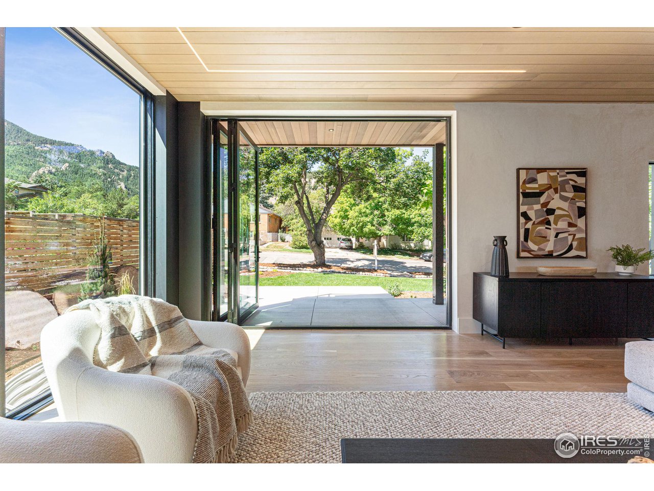 814 7th Street Boulder, CO 80302 - Photo 10 of 40 10 foot panoramic door creating a seamless flow of indoor and outdoor living space surrounding the views