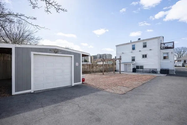 a bathroom with a tub and shower