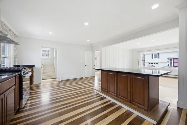 a large kitchen with cabinets