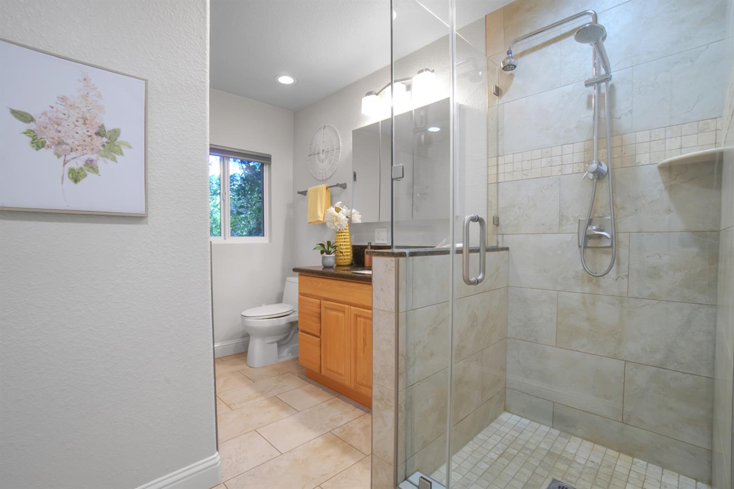 6299 Horseshoe Bar Road Loomis, CA 95650 - Photo 23 of 43 a bathroom with a toilet sink and shower