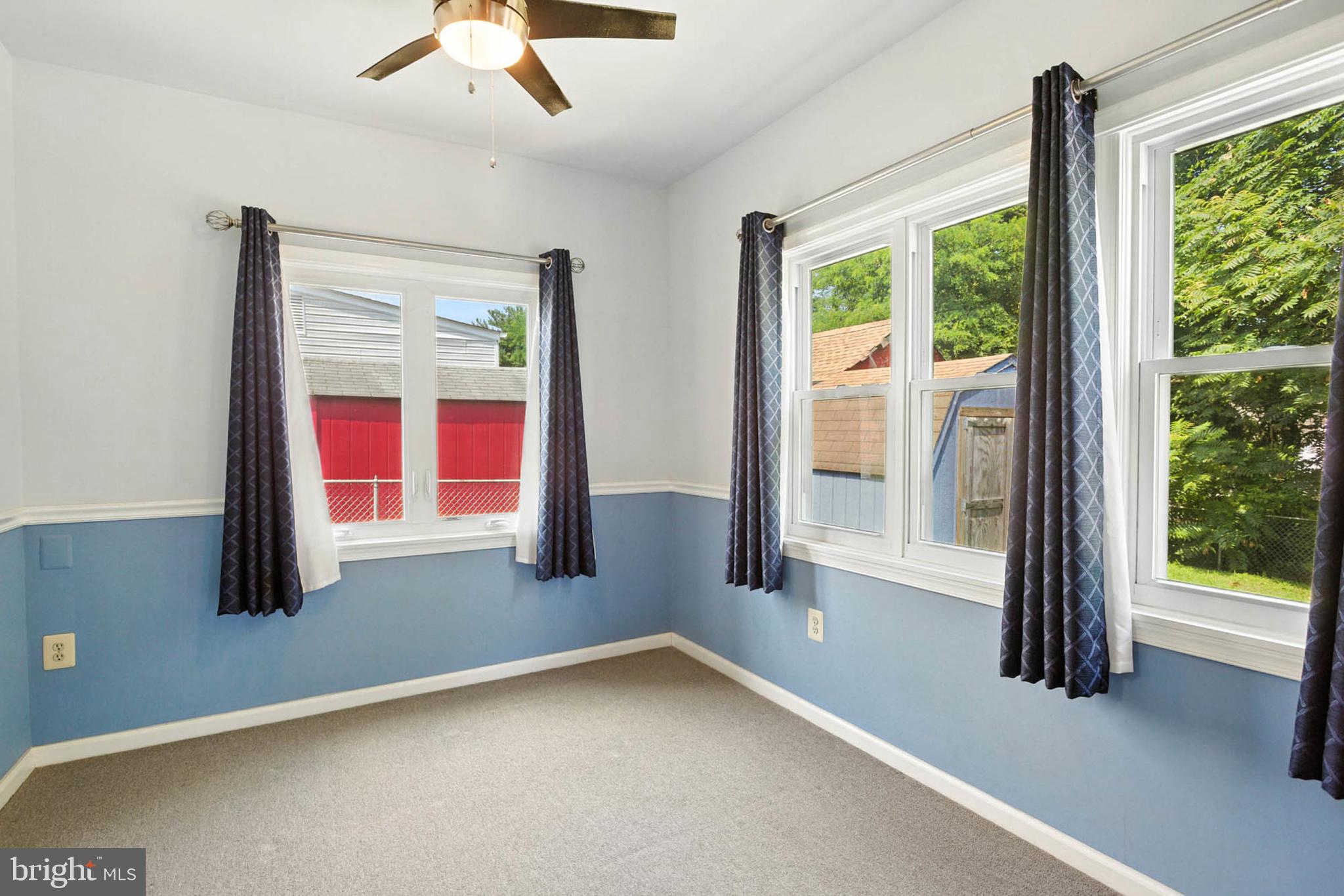 56 Ridgemoor Road Essex, MD 21221 - Photo 11 of 27 a view of an empty room and window