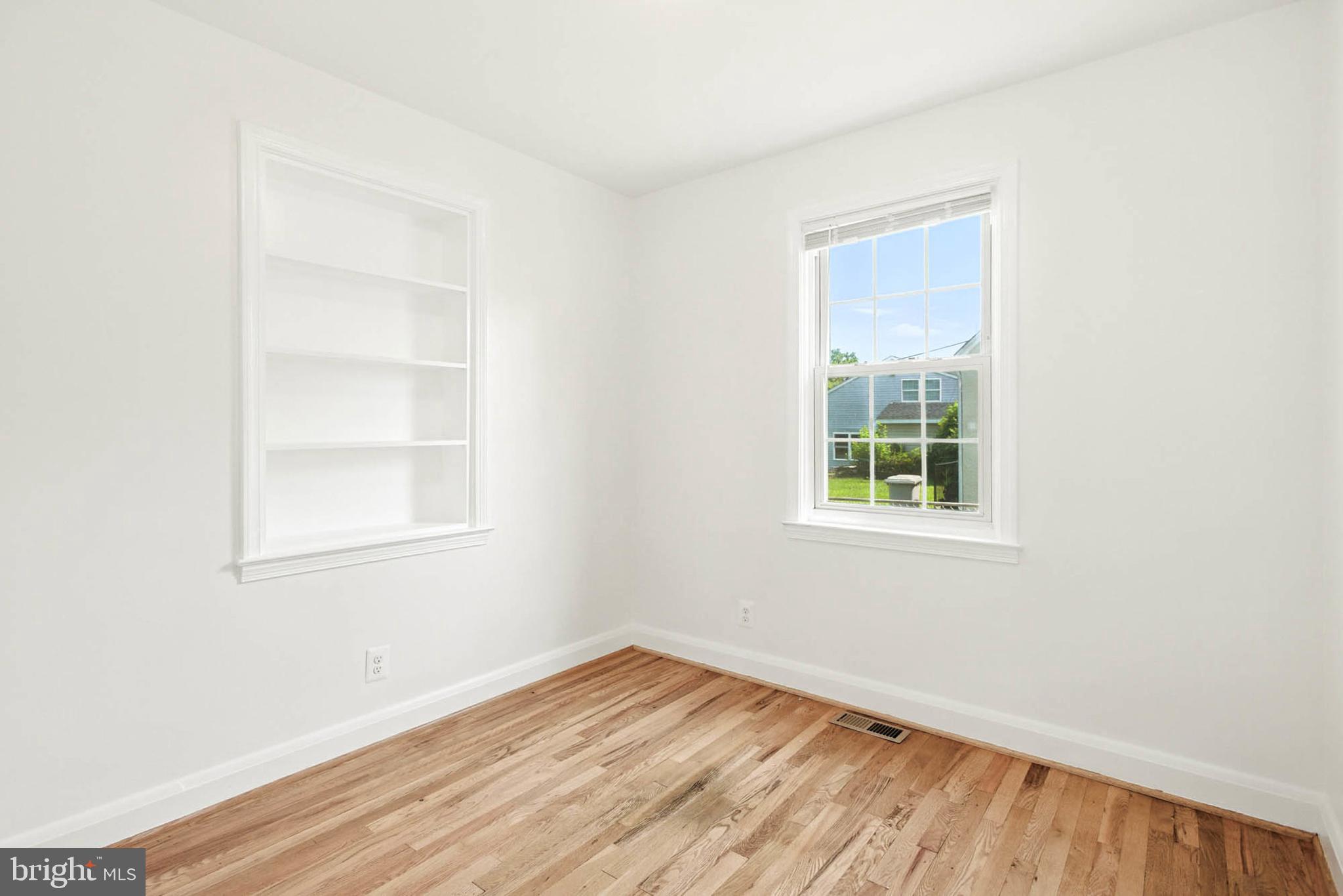 56 Ridgemoor Road Essex, MD 21221 - Photo 15 of 27 an empty room with a window