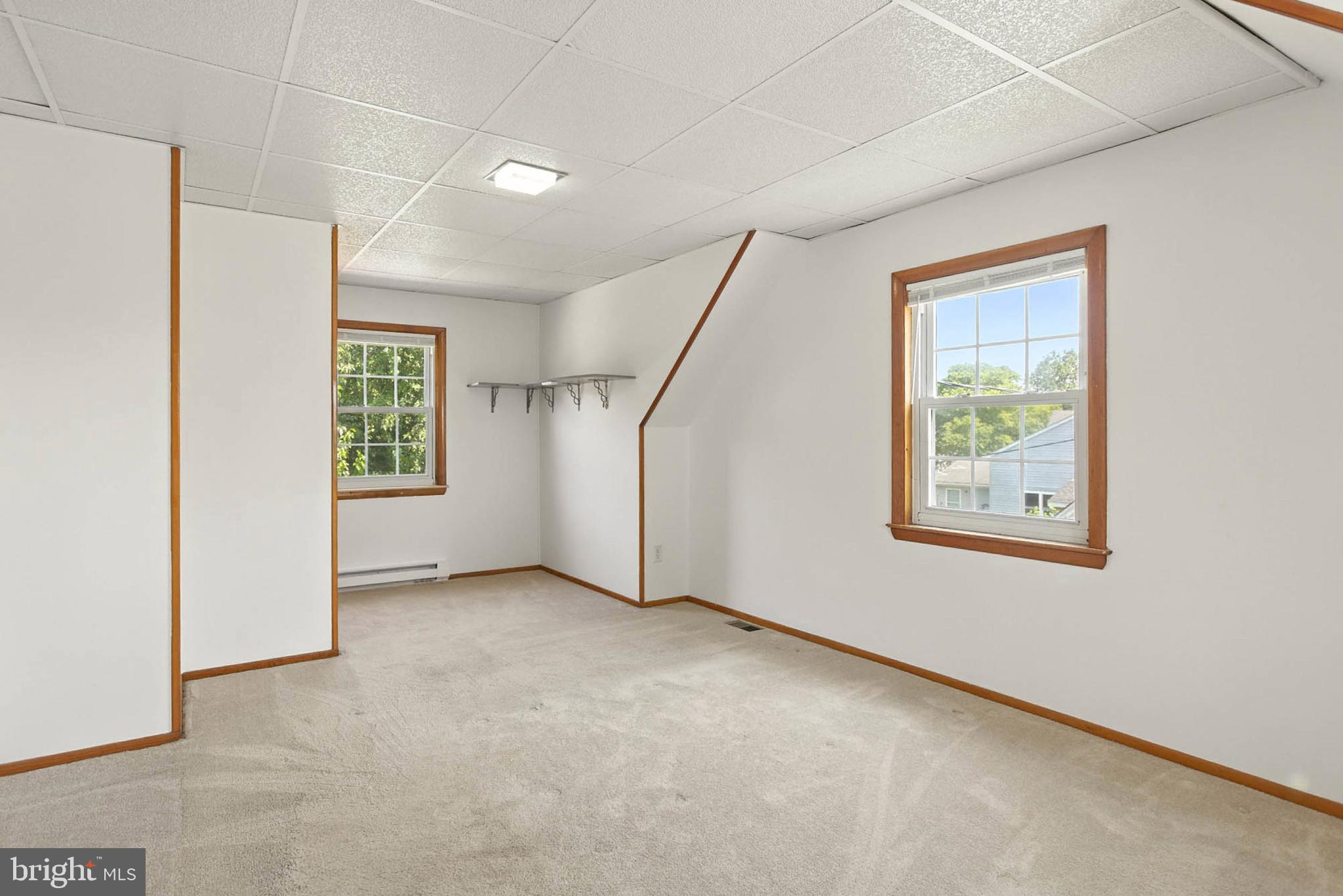 56 Ridgemoor Road Essex, MD 21221 - Photo 20 of 27 an empty room with windows