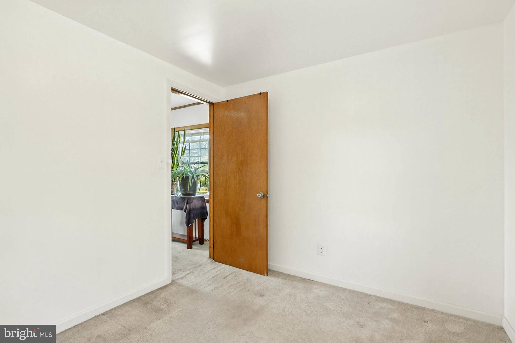 56 Ridgemoor Road Essex, MD 21221 - Photo 24 of 27 a view of an empty room with a window