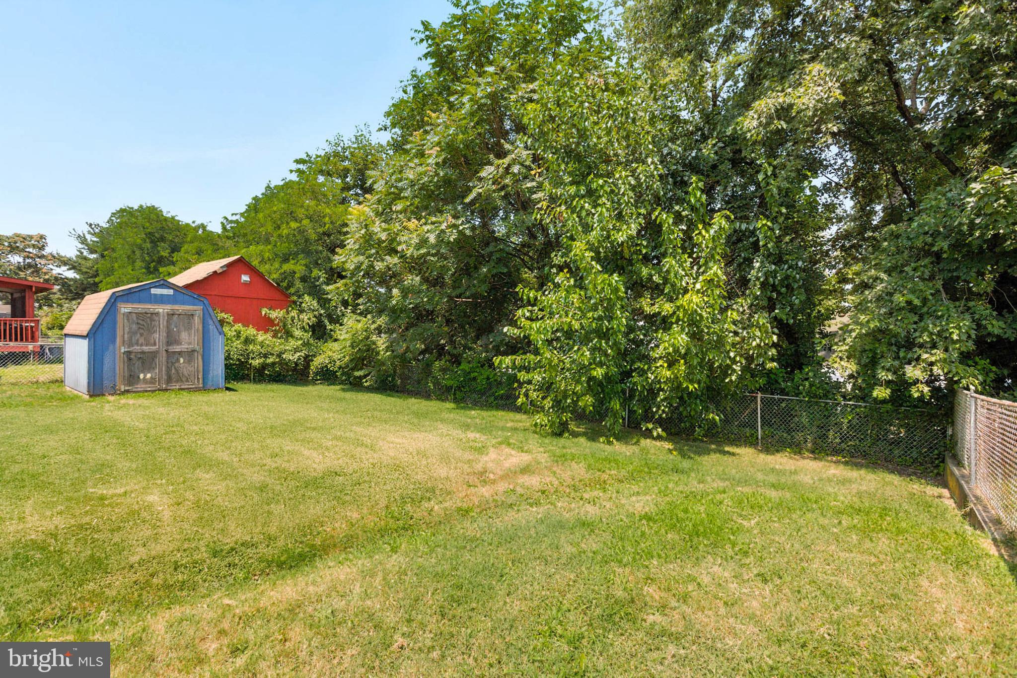 56 Ridgemoor Road Essex, MD 21221 - Photo 26 of 27 a backyard of a house with lots of green space