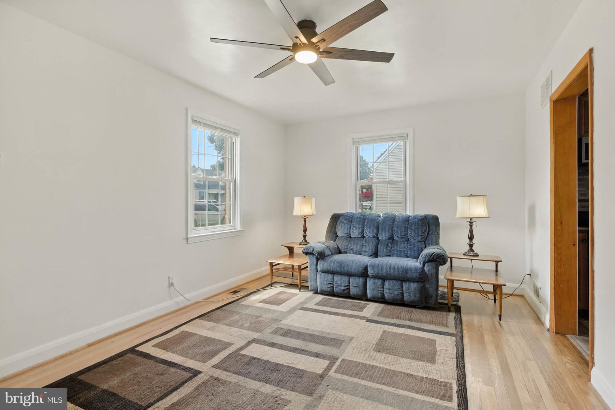 56 Ridgemoor Road Essex, MD 21221 - Photo 5 of 27 a living room with furniture and a window