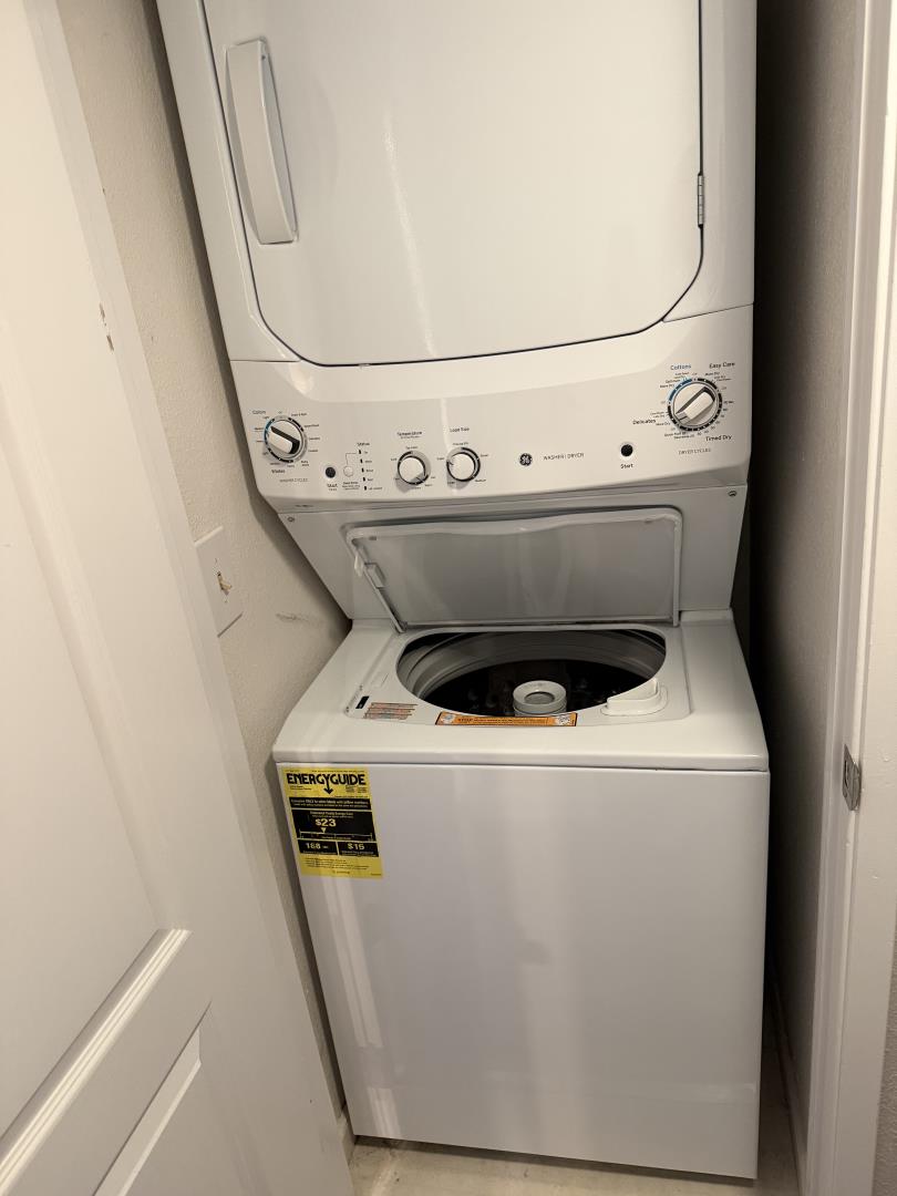 311 Bean Creek Road, Unit 305 Scotts Valley, CA 95066 - Photo 9 of 11 a utility room with dryer and washer