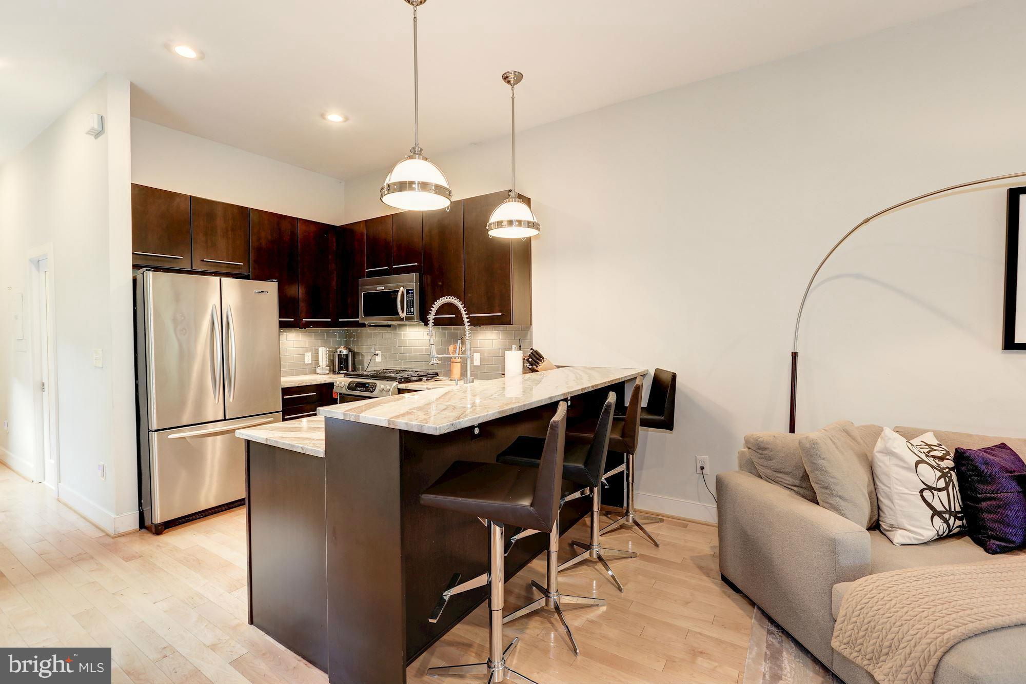 509 P Street Northwest, Unit 1 Washington, DC 20001 - Photo 9 of 21 Main Level - Sleek, Modern Kitchen