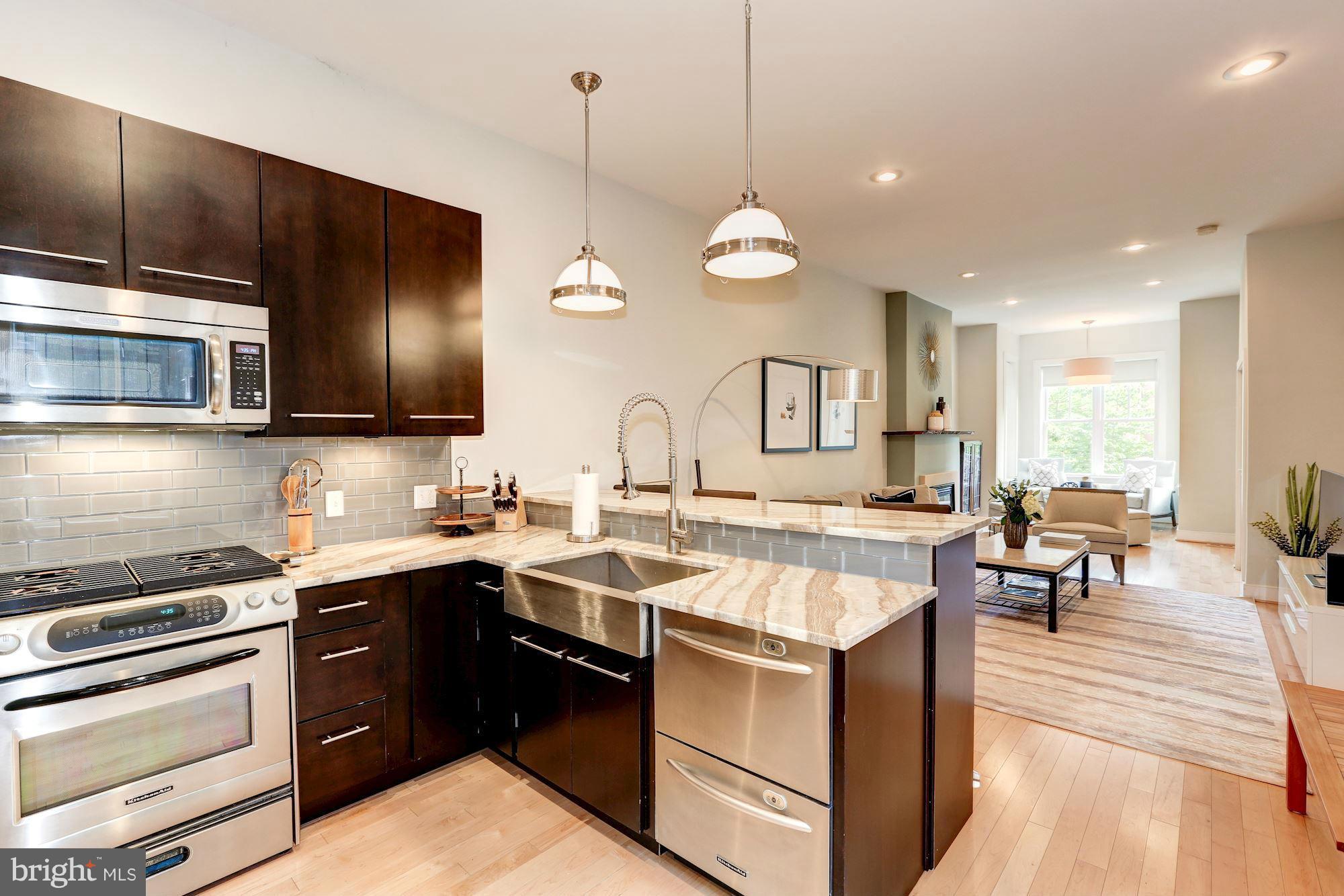 509 P Street Northwest, Unit 1 Washington, DC 20001 - Photo 10 of 21 Main Level - Sleek, Modern Kitchen