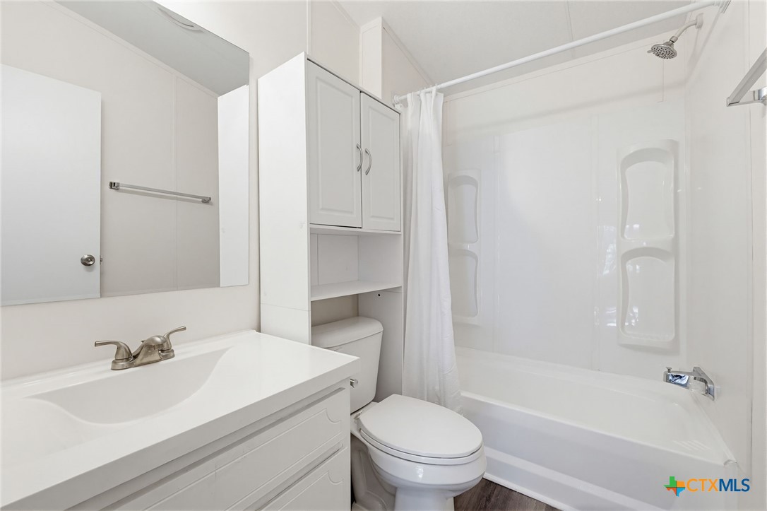 2739 Willow Loop Kempner, TX 76539 - Photo 19 of 30 a bathroom with a sink toilet and shower