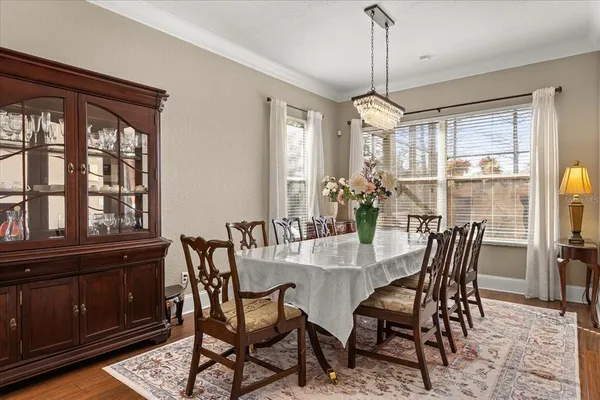 a large kitchen with stainless steel appliances granite countertop a lot of counter space and a sink