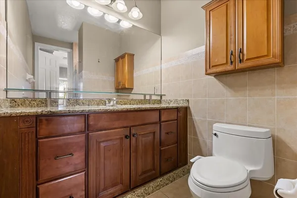 a front view of a house with a boat