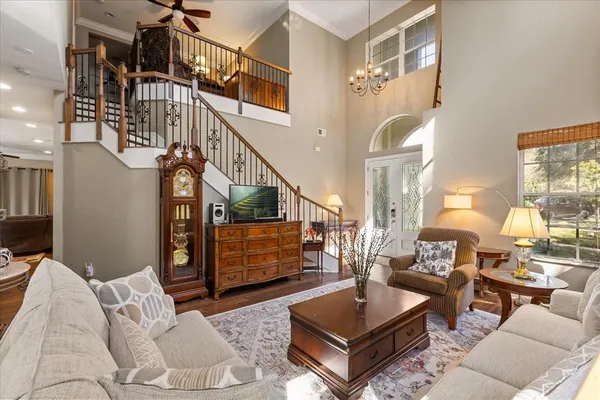 a living room with furniture and a table