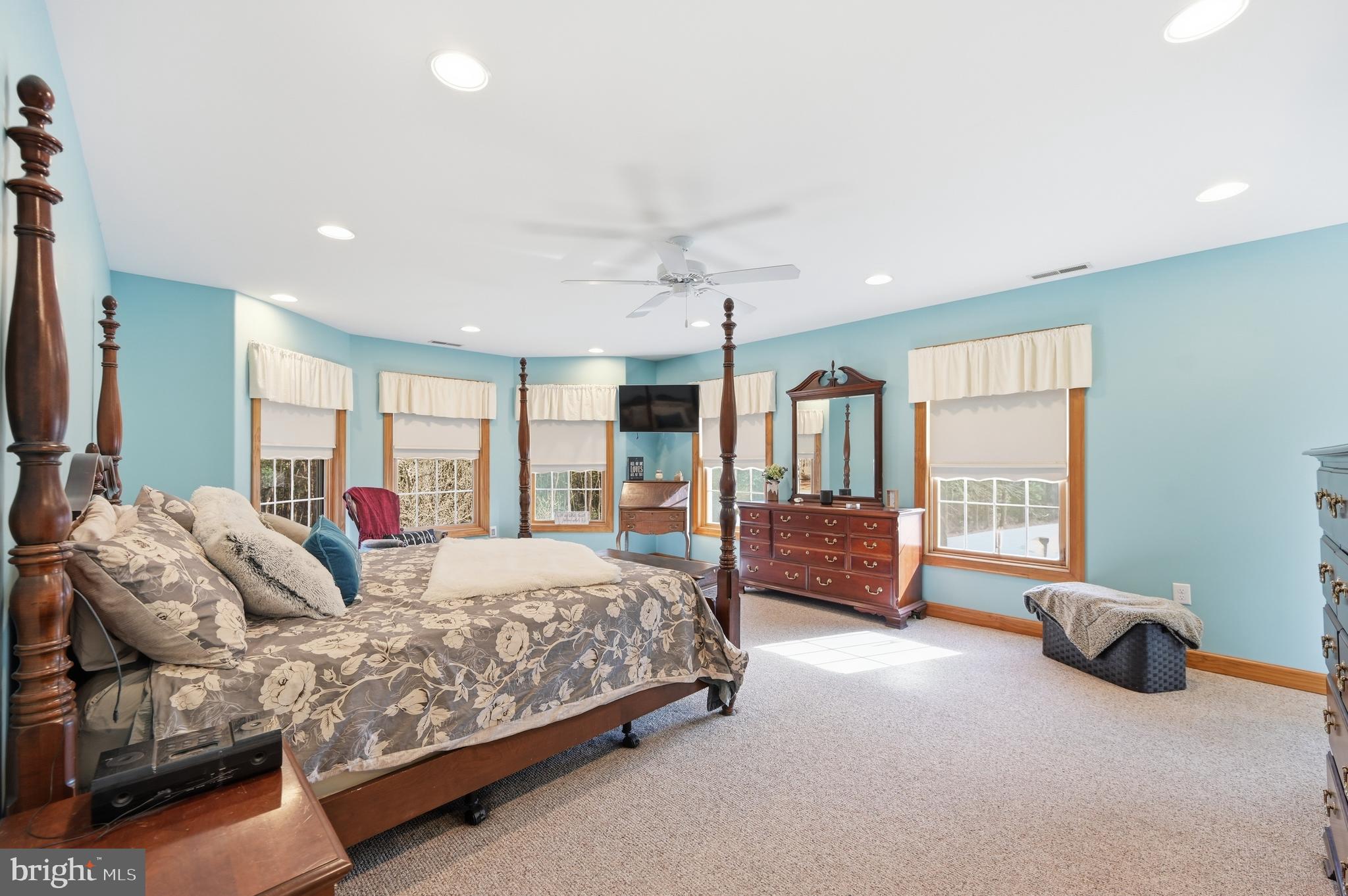18981 Kenney Road Delmar, DE 19940 - Photo 17 of 31 a bedroom with bed and glass door