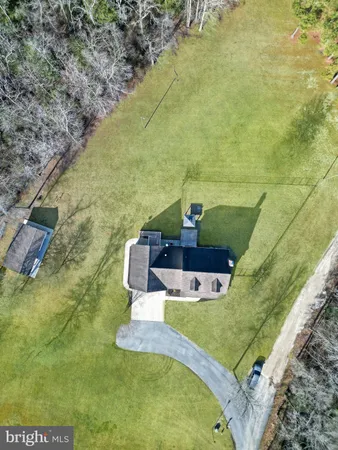a view of a two chairs in the terrace