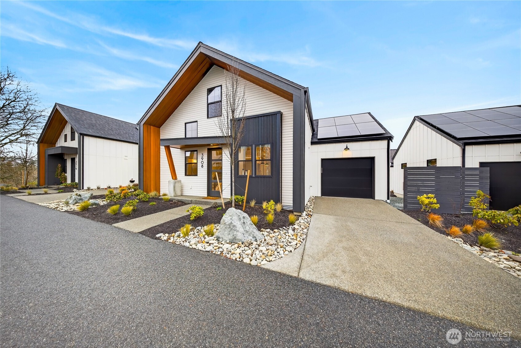 a front view of house with yard outdoor seating and barbeque oven