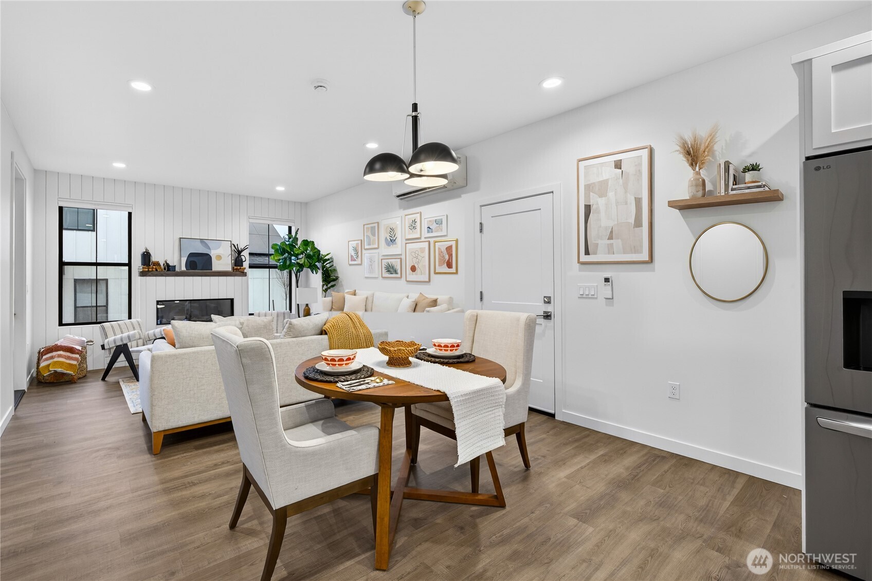 3908 Crosswinds Court Anacortes, WA 98221 - Photo 12 of 34 a view of a dining room with furniture window and wooden floor