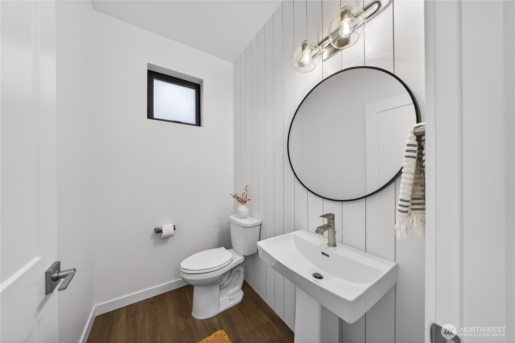 3908 Crosswinds Court Anacortes, WA 98221 - Photo 18 of 34 a bathroom with a toilet a sink and a mirror