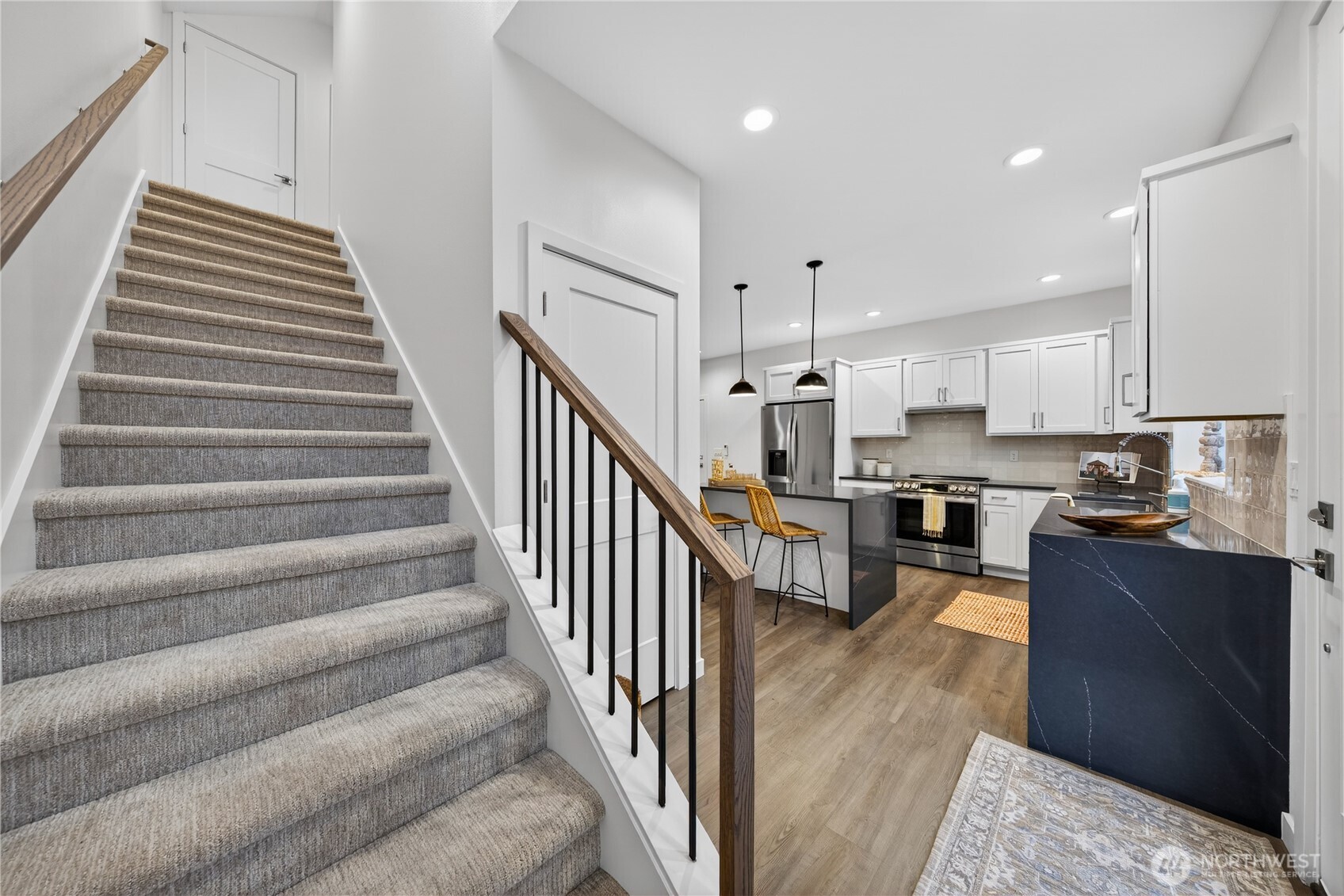 3908 Crosswinds Court Anacortes, WA 98221 - Photo 19 of 34 a view of kitchen with sink microwave and stove