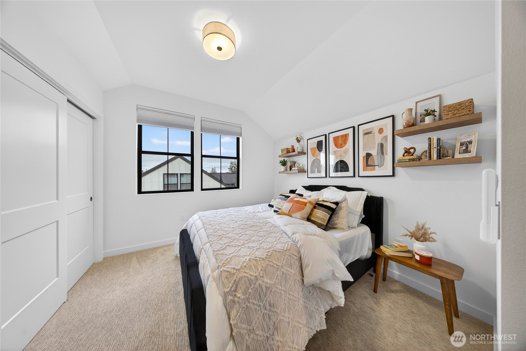 3908 Crosswinds Court Anacortes, WA 98221 - Photo 20 of 34 a bedroom with a bed and a window