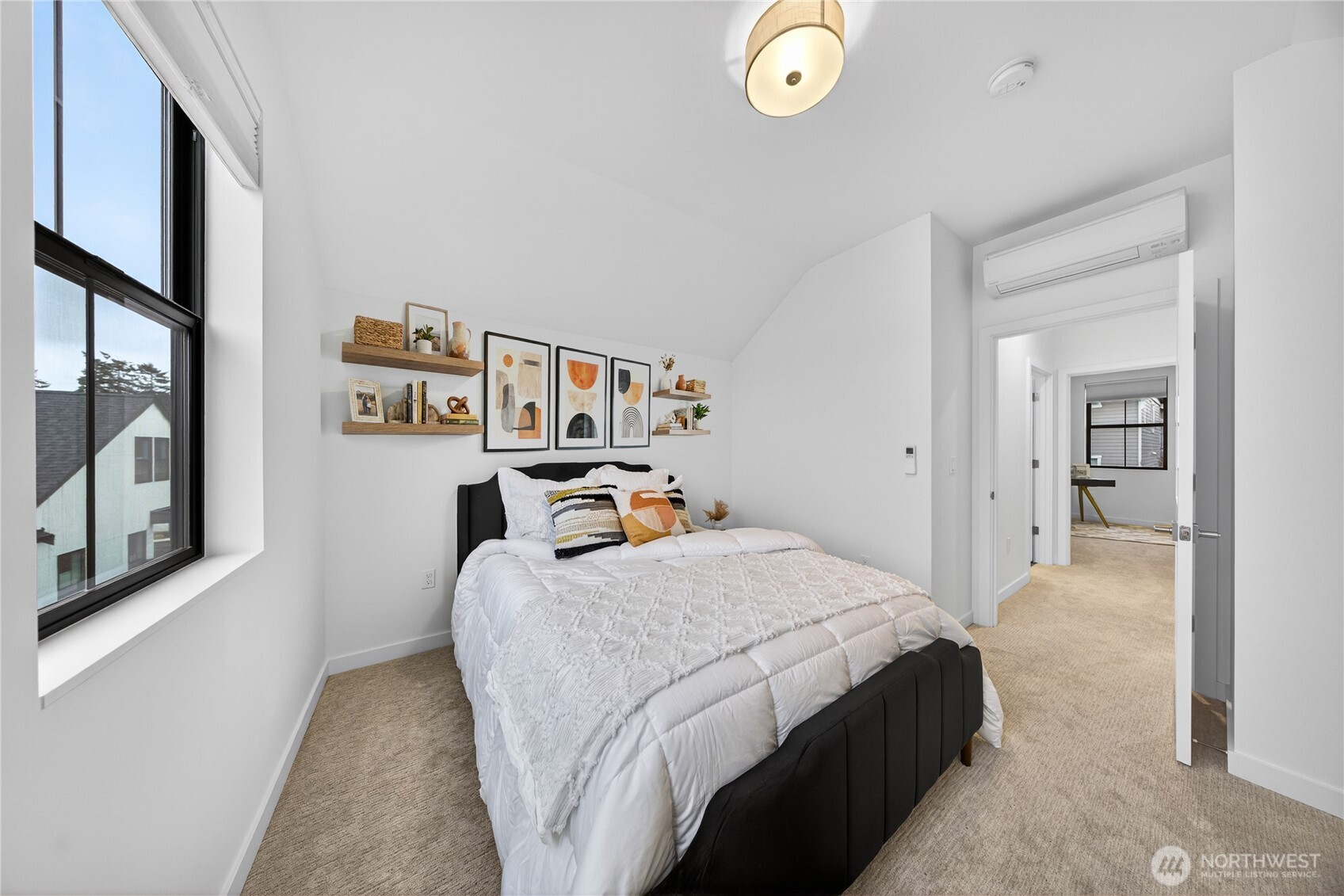 3908 Crosswinds Court Anacortes, WA 98221 - Photo 21 of 34 a bedroom with a bed and walk in closet