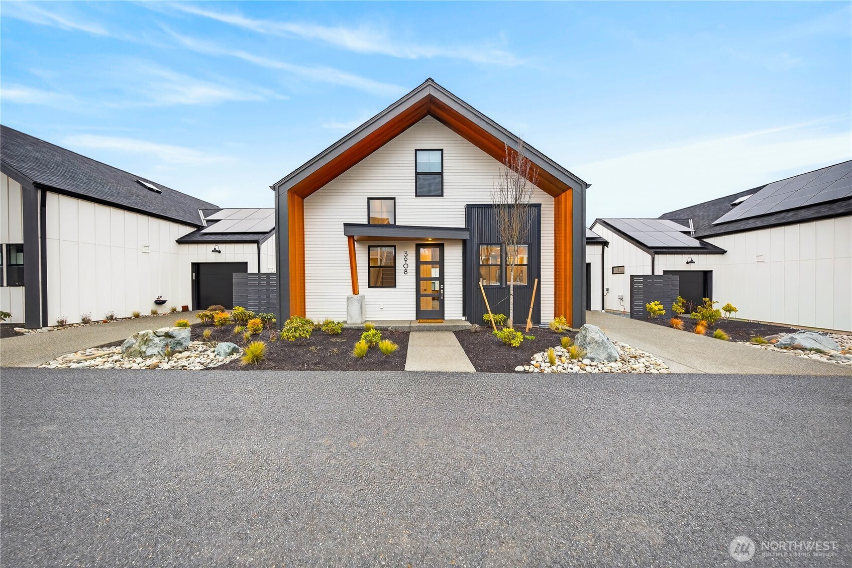 3908 Crosswinds Court Anacortes, WA 98221 - Photo 26 of 34 a front view of a house with a yard