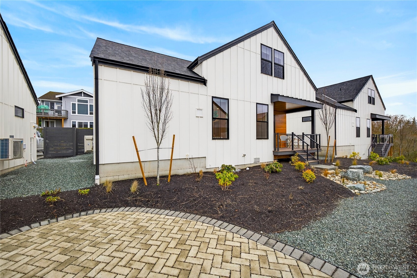 3908 Crosswinds Court Anacortes, WA 98221 - Photo 28 of 34 a front view of a house with garden