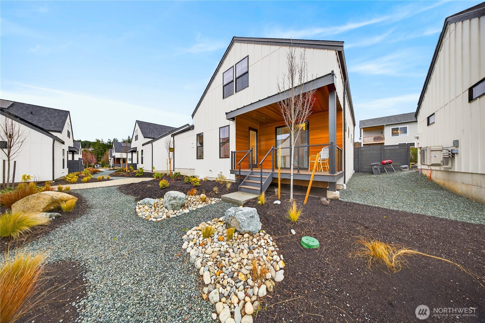 3908 Crosswinds Court Anacortes, WA 98221 - Photo 29 of 34 a front view of a house with patio