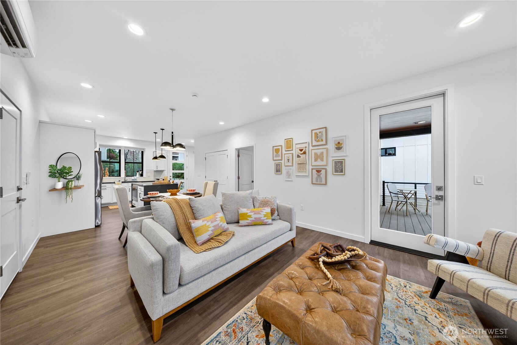 3908 Crosswinds Court Anacortes, WA 98221 - Photo 3 of 34 a living room with furniture and wooden floor
