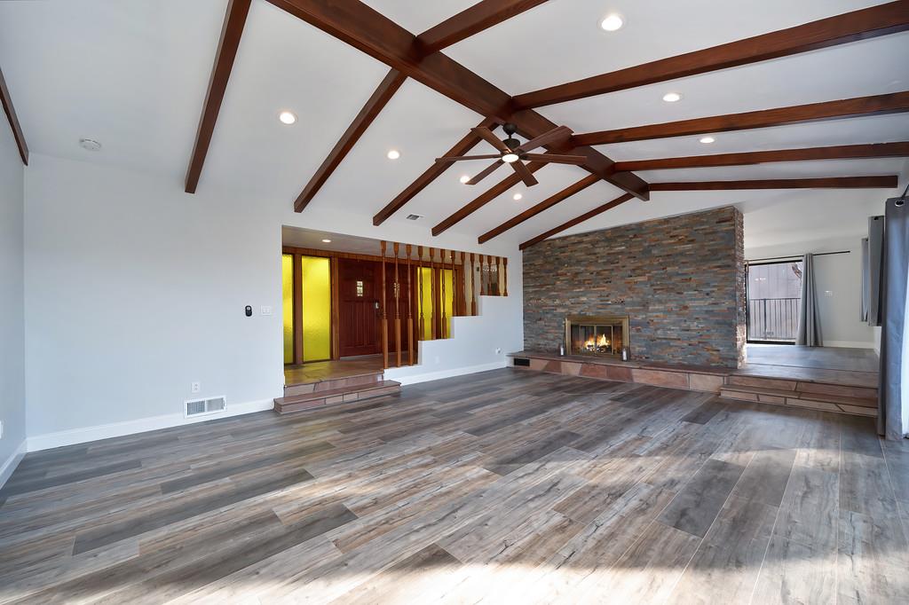 2298 Pinon Road Rescue, CA 95672 - Photo 11 of 67 a view of an empty room with wooden floor and a window